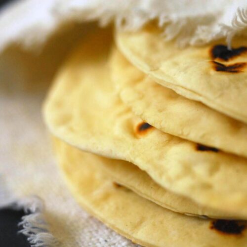 https://www.homesicktexan.com/wp-content/uploads/2007/03/Flour-tortillas-DSC_0210-500x500.jpg