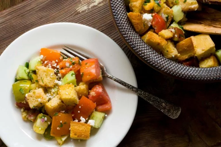 Tomato and cucumber salad with cornbread croutons