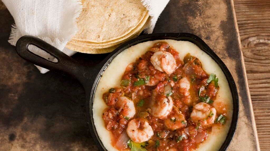 Shrimp queso flameado with ranchera salsa | Homesick Texan