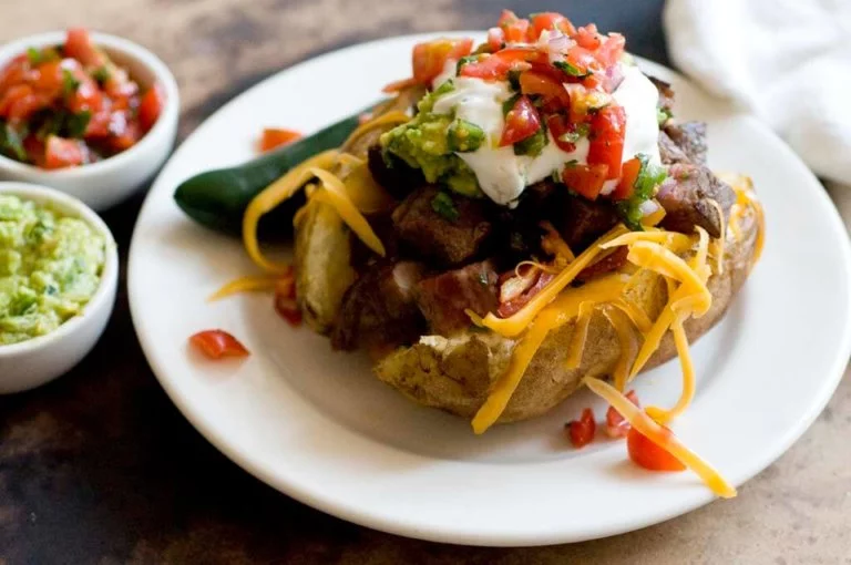 Carne asada stuffed potatoes