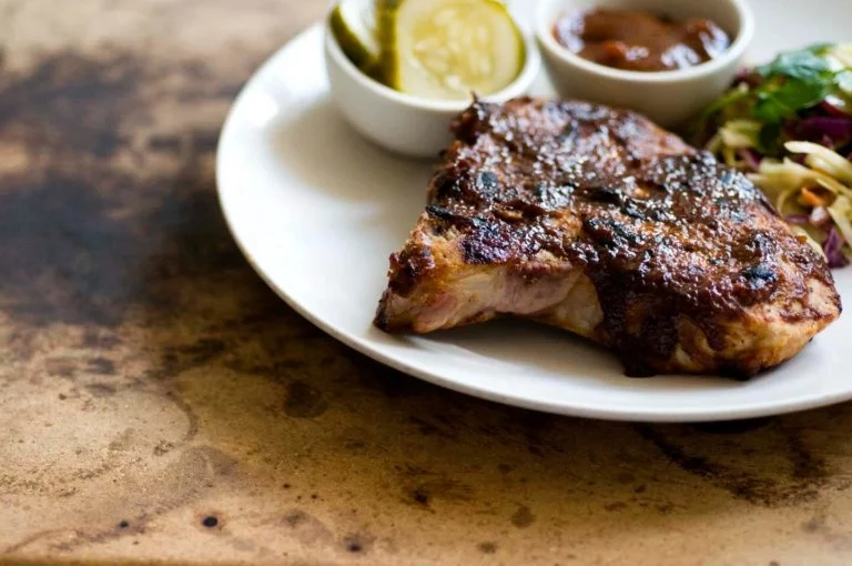 Pork chops with jalapeño peach barbecue sauce