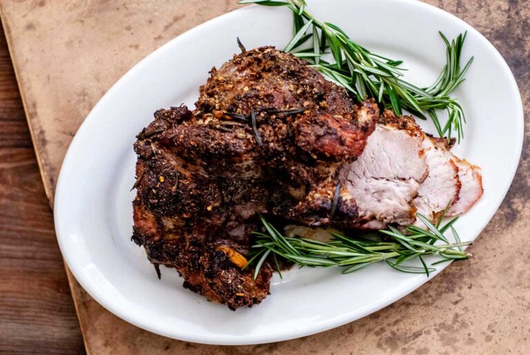 Pork shoulder roast with garlic citrus and herbs DSC 5722