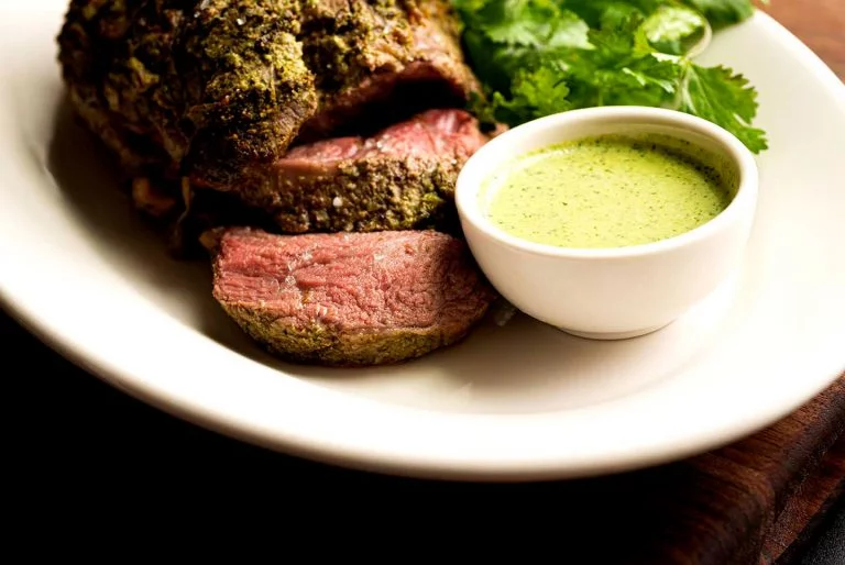 Roast lamb with jalapeño yogurt sauce